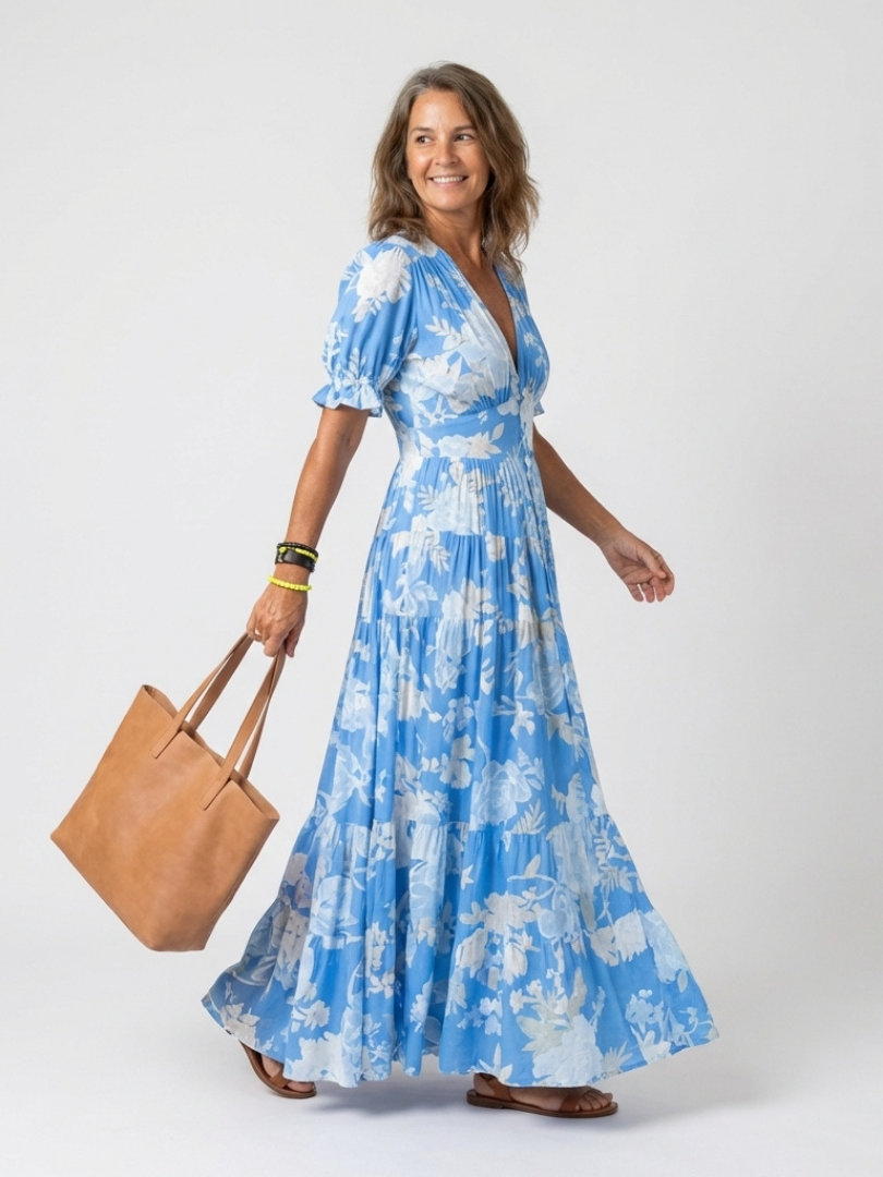 Elegancka midi sukienka bez rękawów w kwiaty z dekoltem V na lato